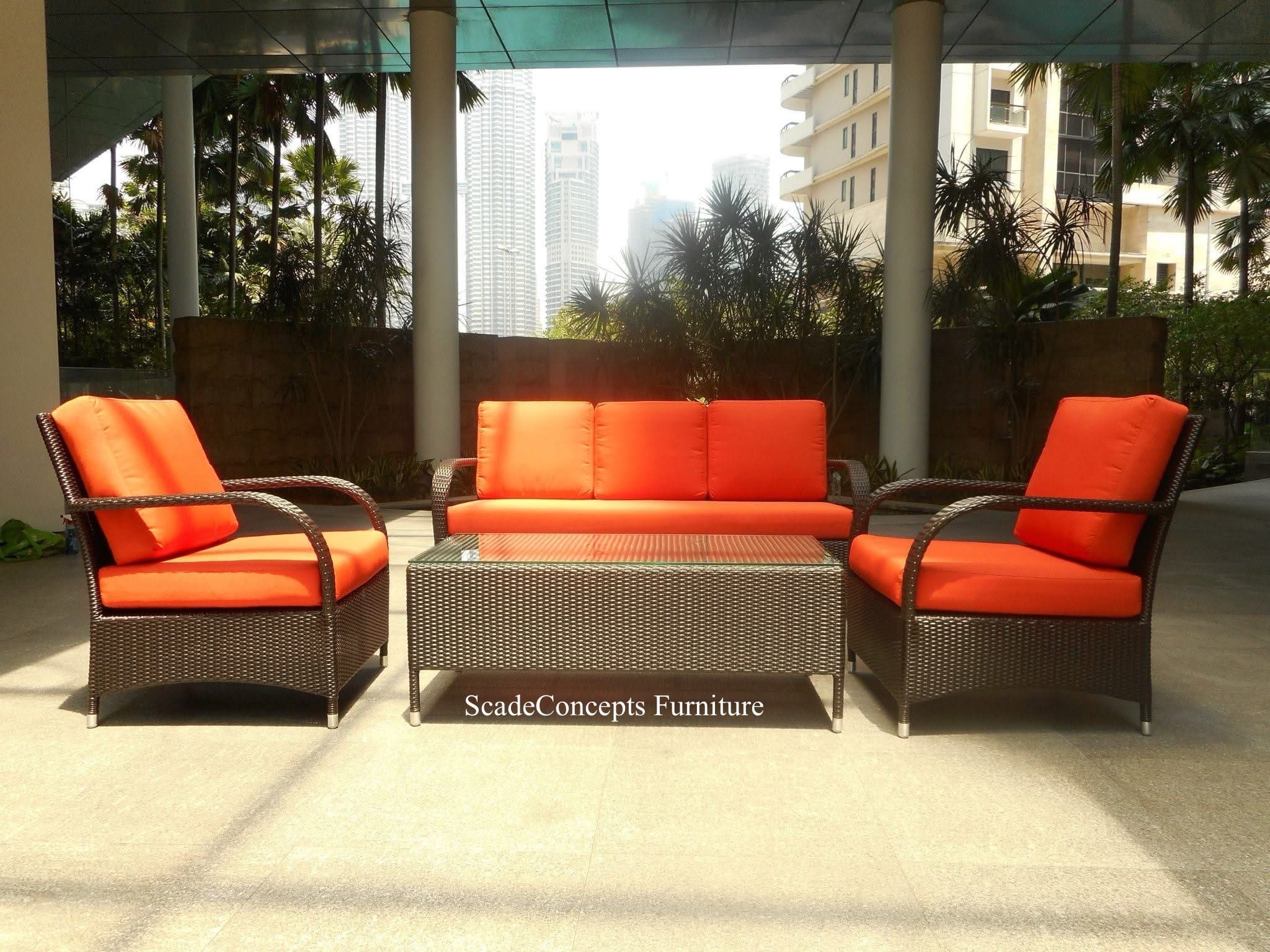 Commercial Projects black wicker sofa set coffee table orange cushions at lobby area 1
